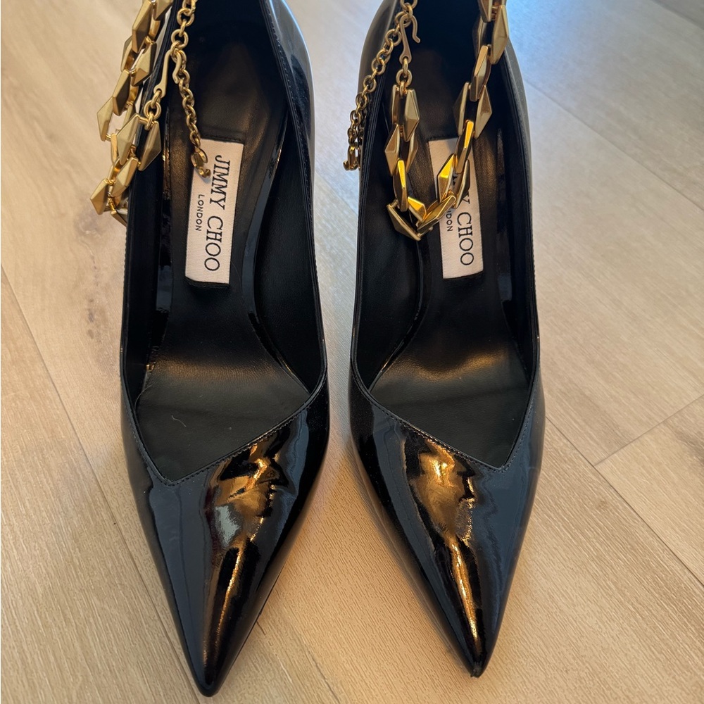 Jimmy Choo Black Patent Pointed Toe Pumps with Gold Chain Accent